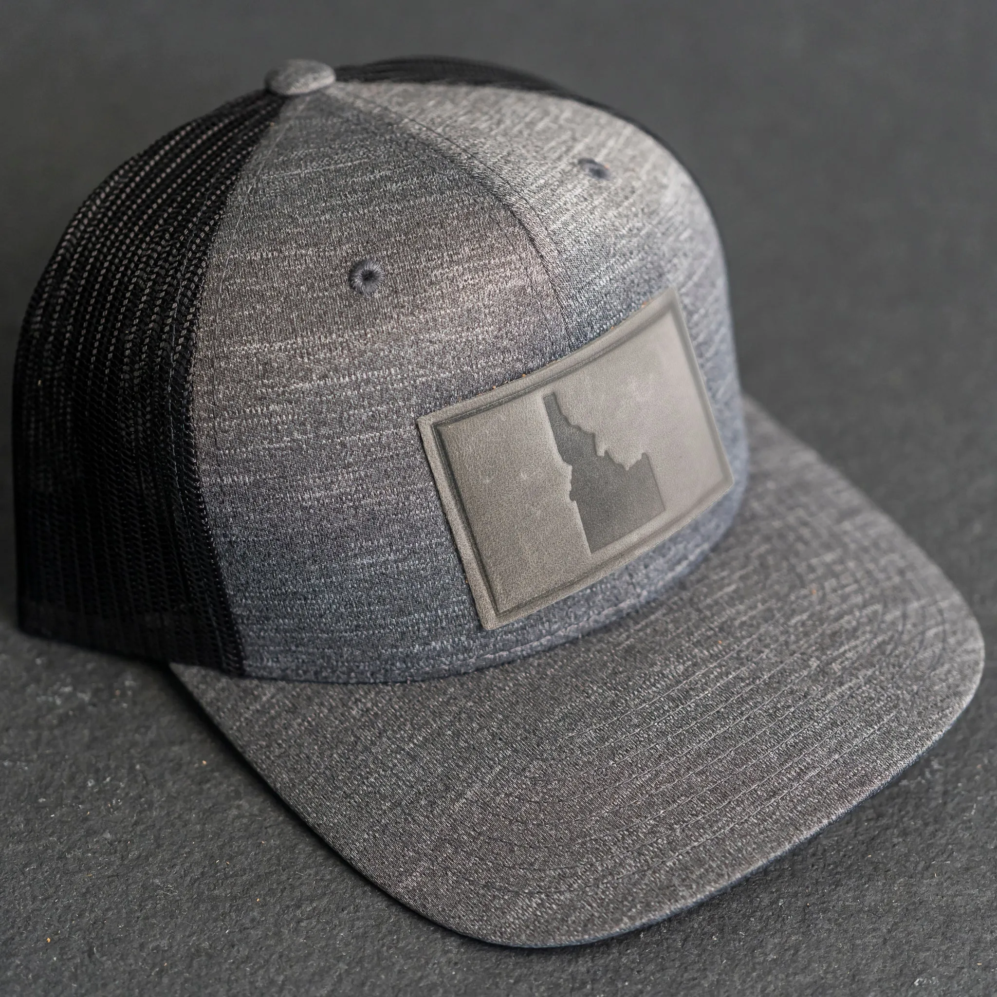 Leather Patch Performance Style Trucker Hat - Idaho Stamp